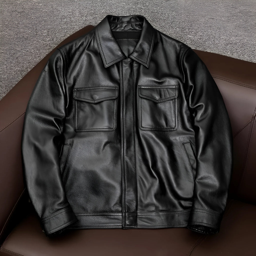 Men's black retro-style leather jacket with side pockets showing loose fit design