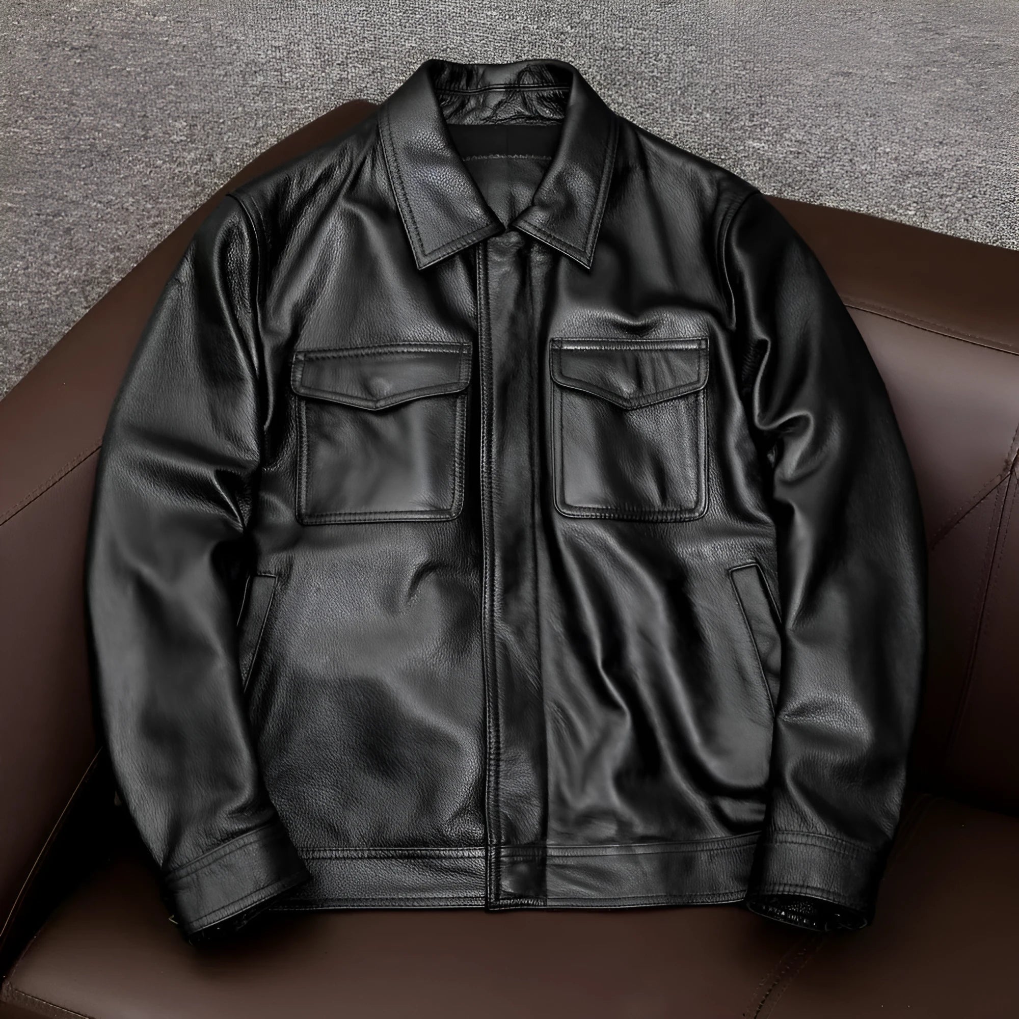 Men's black retro-style leather jacket with side pockets showing loose fit design