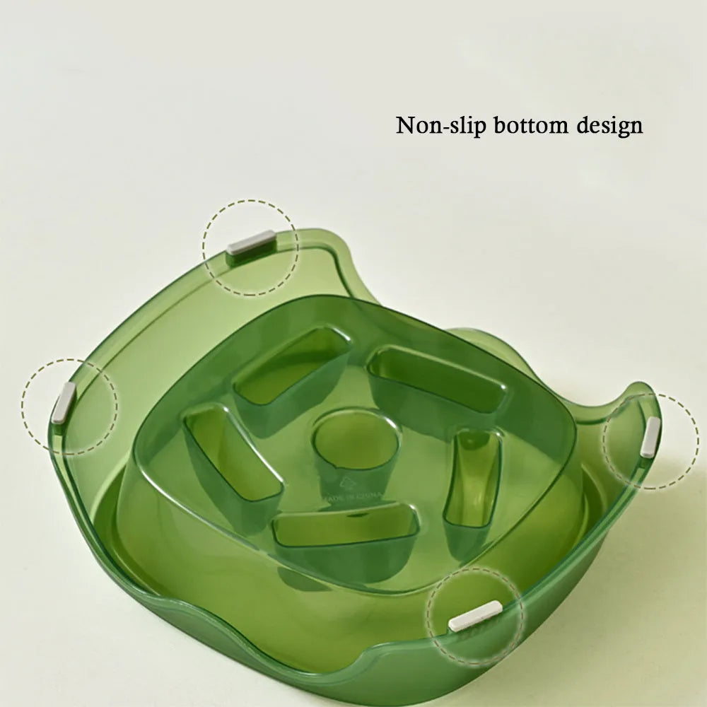 Blue plastic slow feeder dog bowl with raised internal maze pattern to prevent fast eating.
