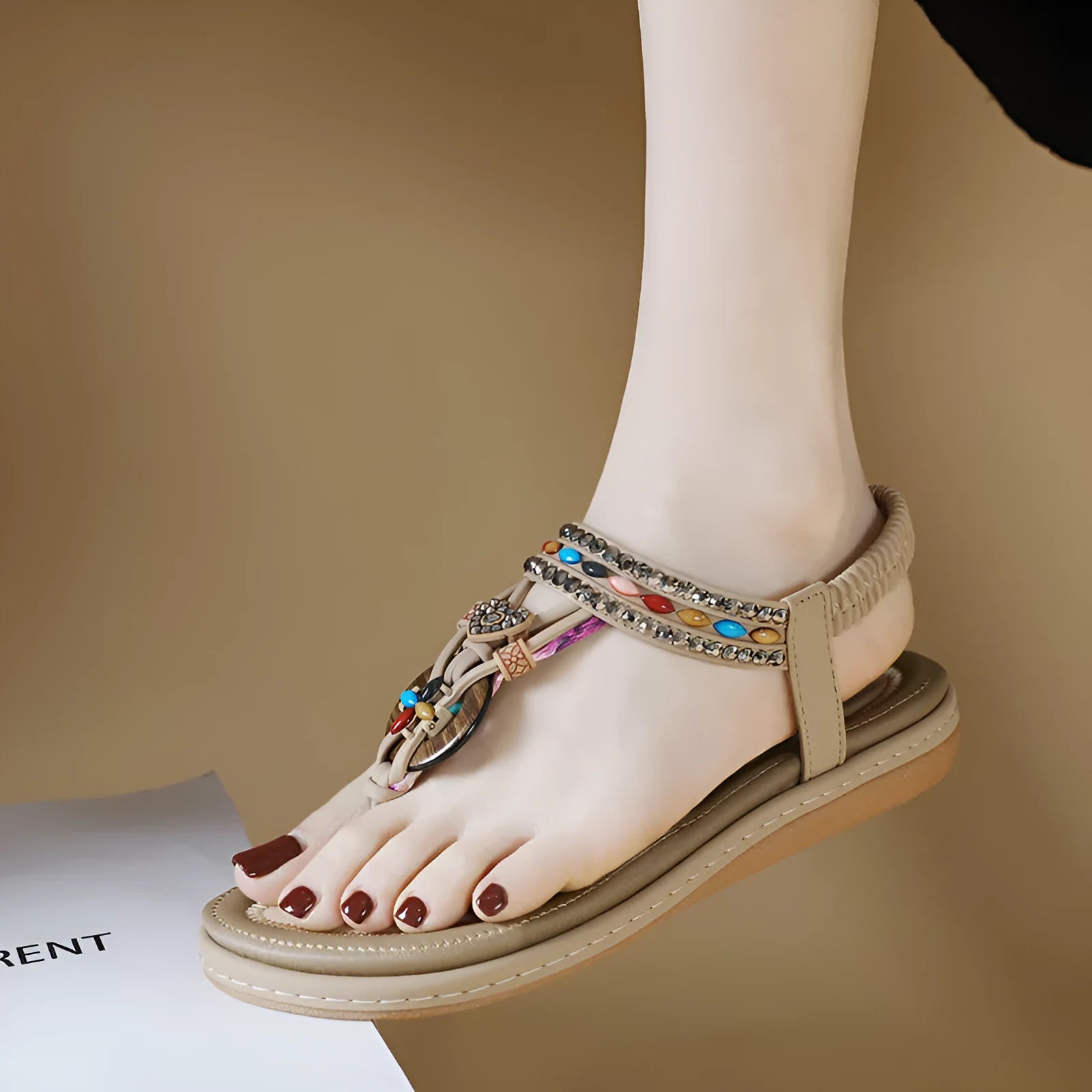 Women's rhinestone flip-flop sandals with leather lining and TPR sole in apricot, black, and khaki