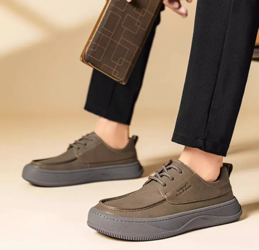 Brown retro-style casual leather shoes with big toe design on a neutral background