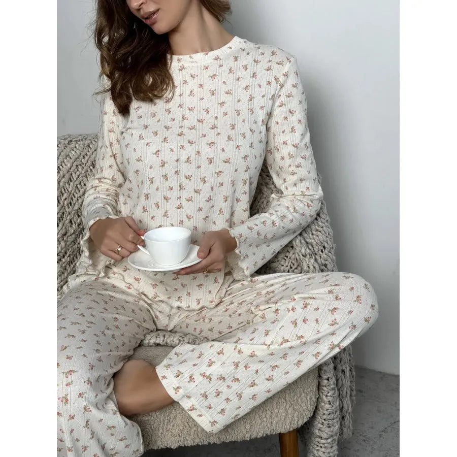 White floral print women's suit with long bell sleeve top and wide-leg trousers