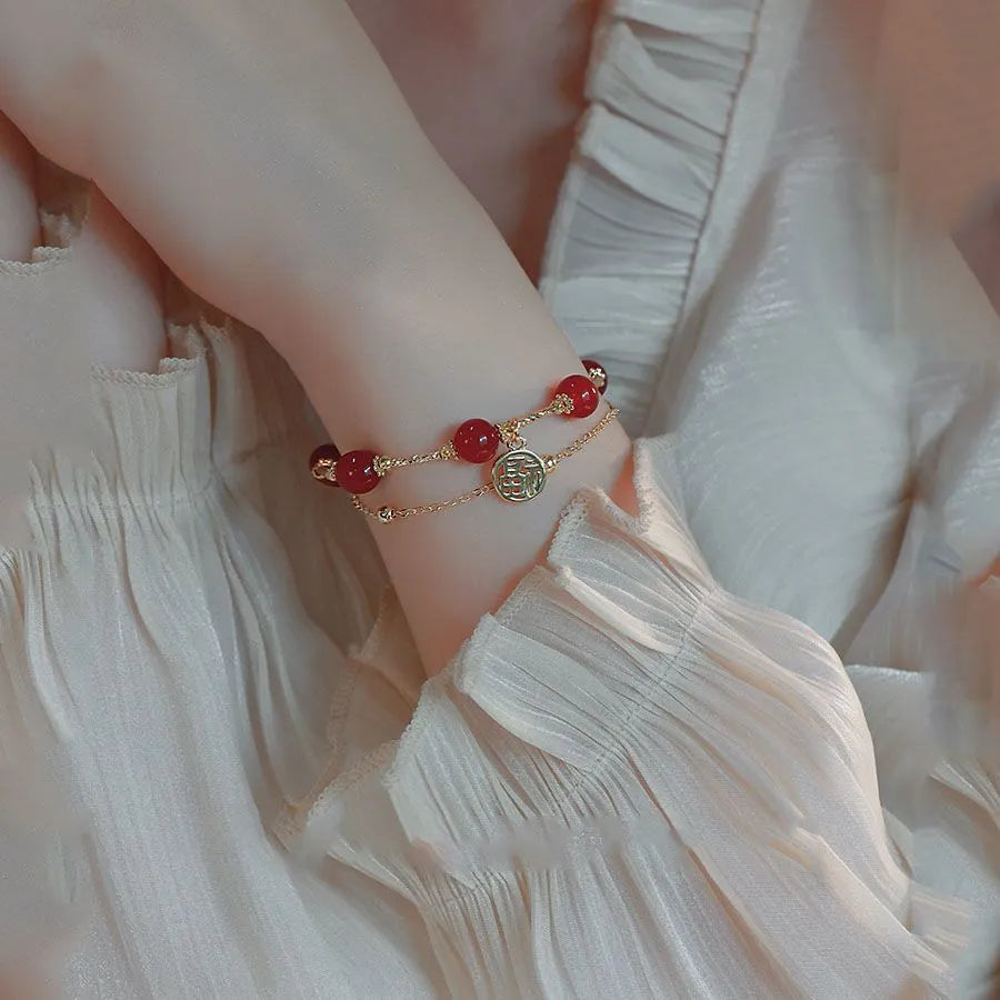 Women's red agate and alloy Hongma lucky card double-layer bracelet in gift box.