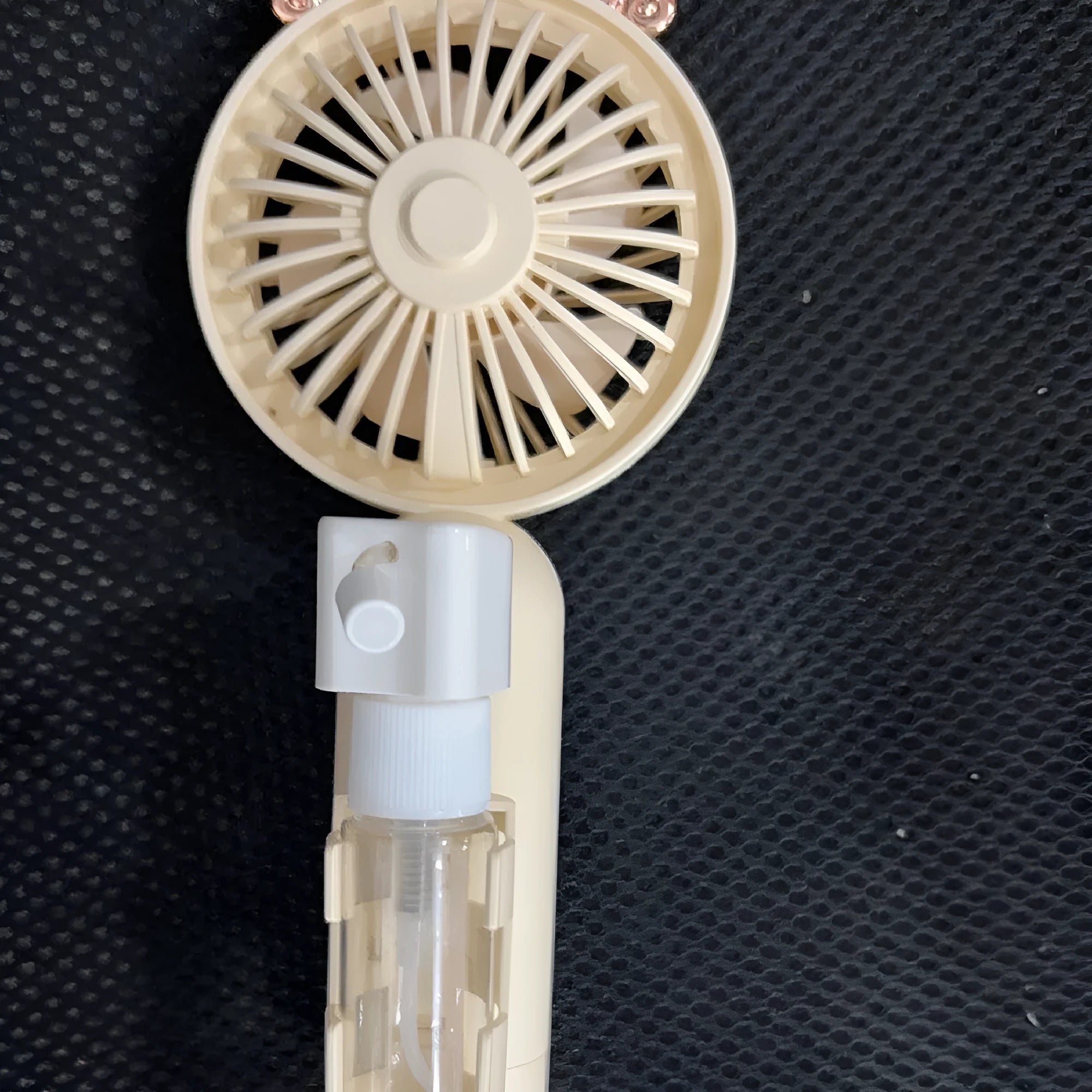 Plastic nozzle handheld fan with USB charging in multiple colour options