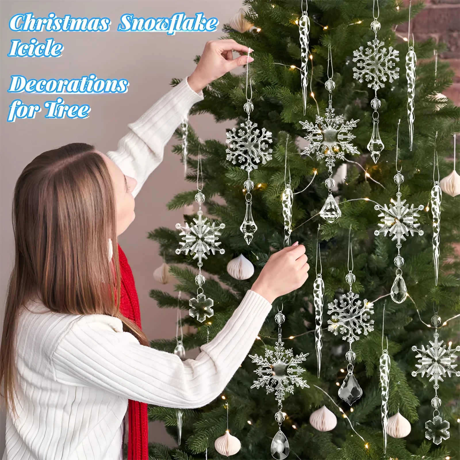 Set of ten clear acrylic icicle and snowflake Christmas ornaments with white hanging ribbons.