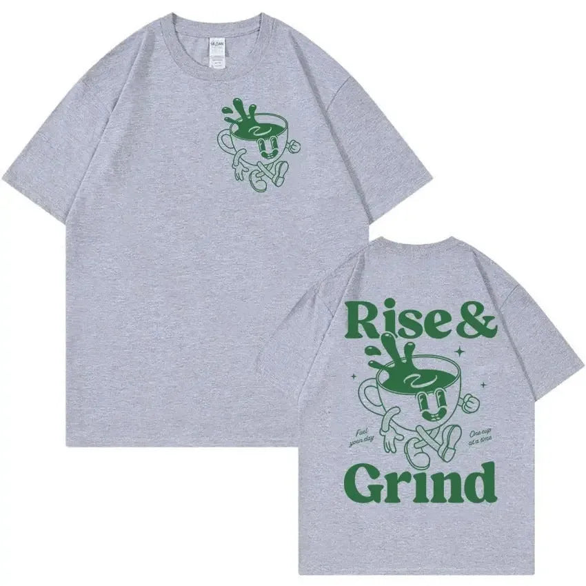 Man wearing a loose grey linen t-shirt with a Rise and Grind Green Coffee cartoon print design.