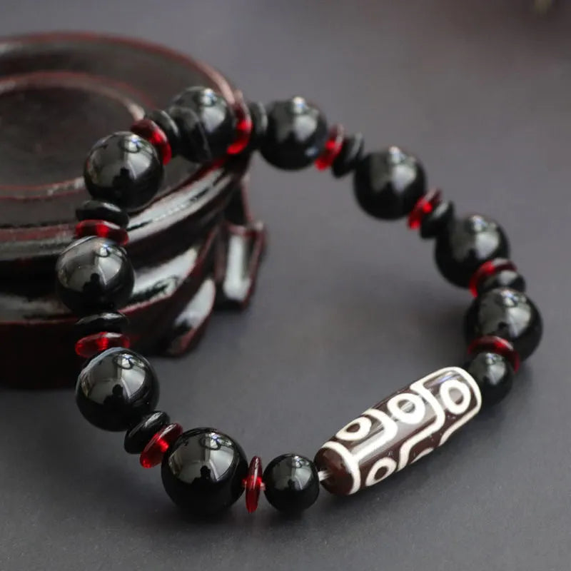 Hand-woven black agate dzi bead bracelet with 11mm geometric beads