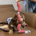 Brown sausage-link dog hand rope toy with grip tape, total length 108cm.
