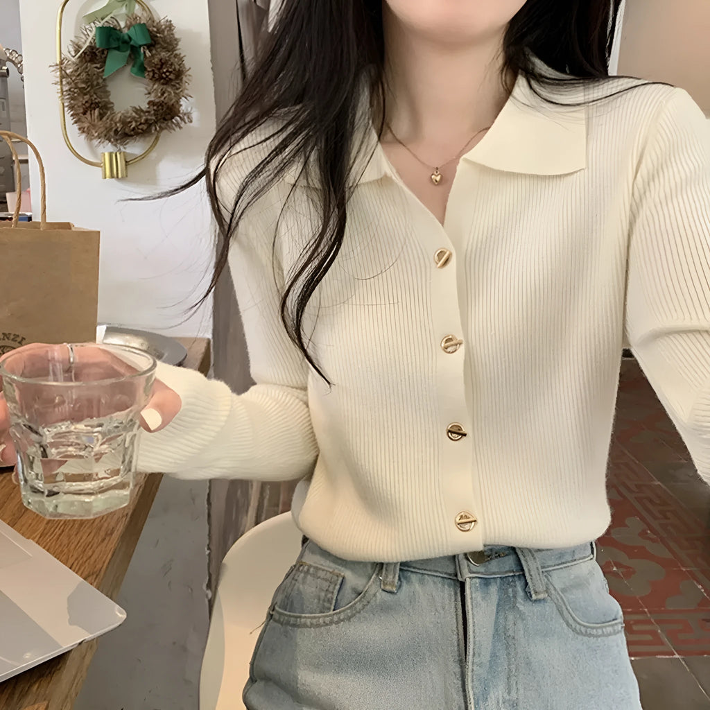 Long sleeve knitted cardigan in viscose fibre showing loose fit and available in beige, black, oatmeal, green, and khaki colours
