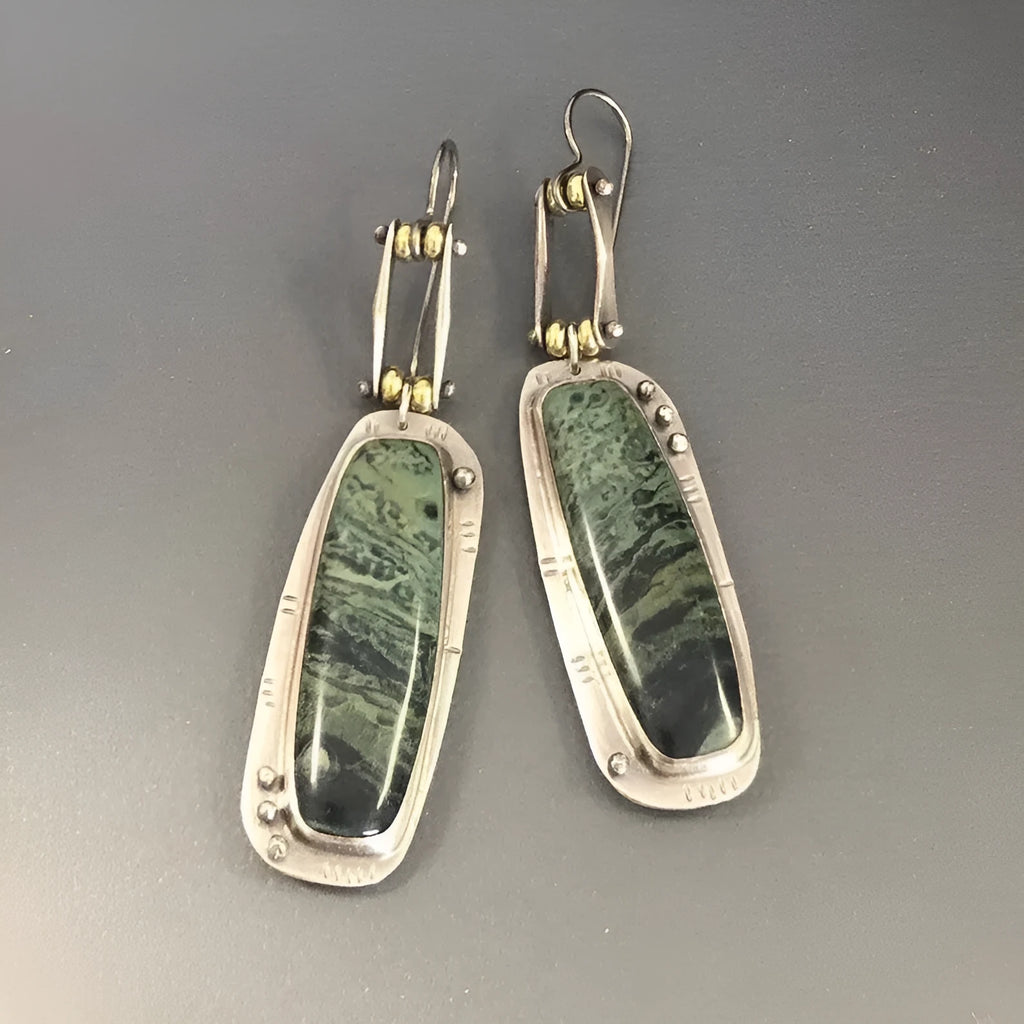 Geometric two-tone marble pattern alloy earrings with simple modern design