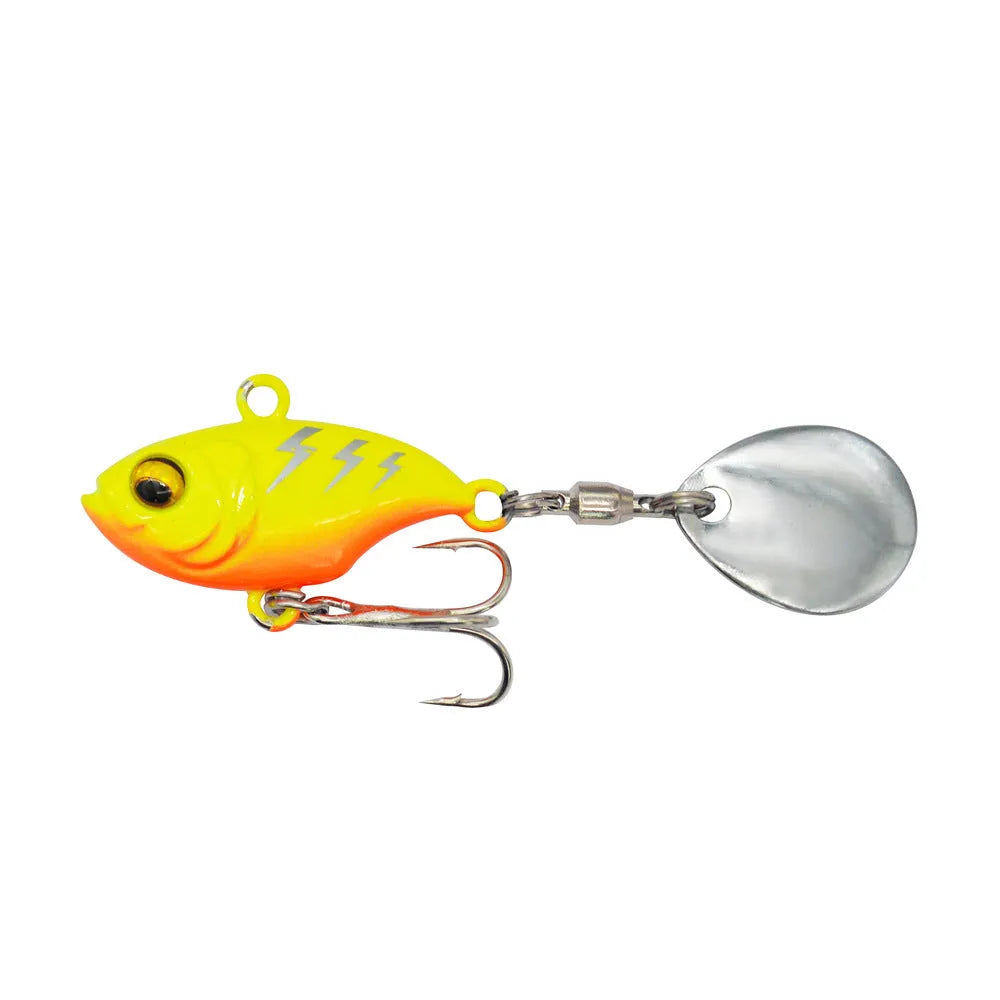 Metal sea fishing lure with rotating sequin in multiple colour options including zebra patterns