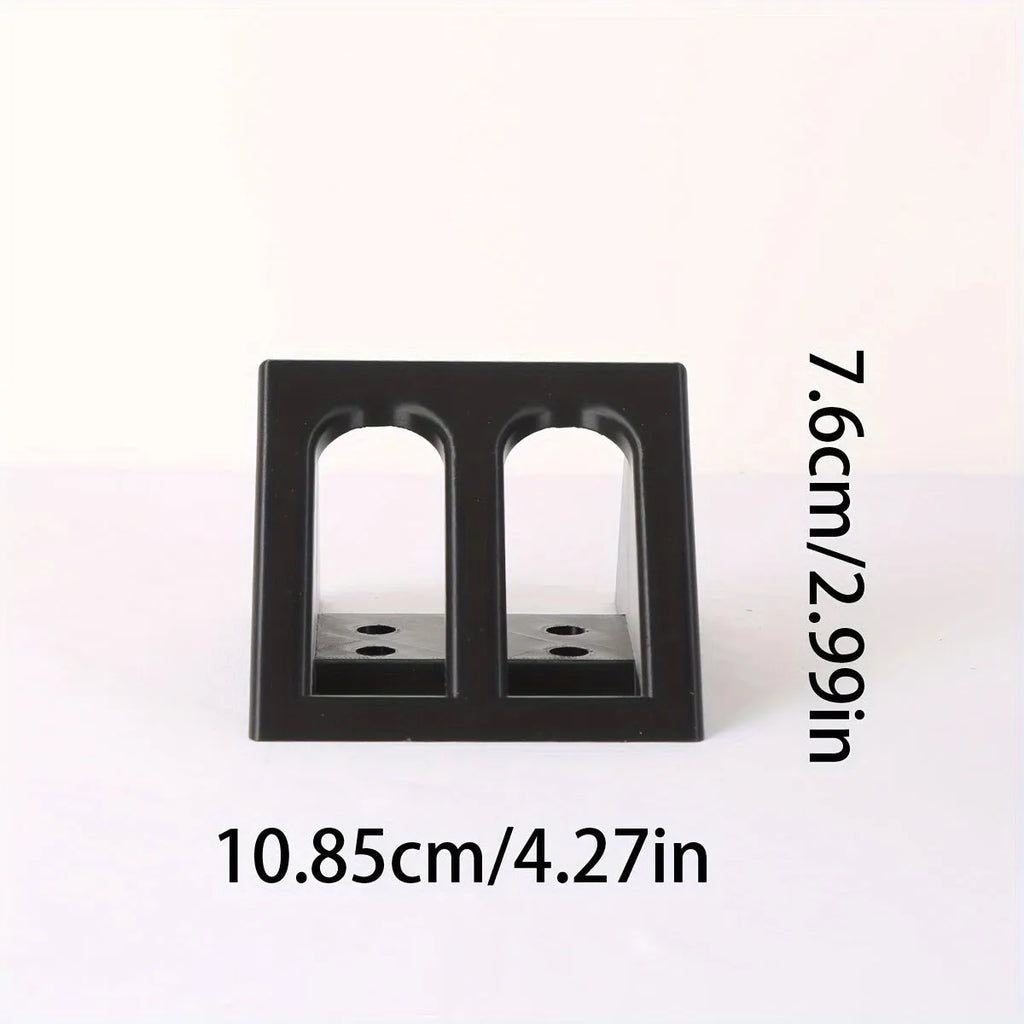 Black plastic punk-style pistol display stand for toy guns and replicas.