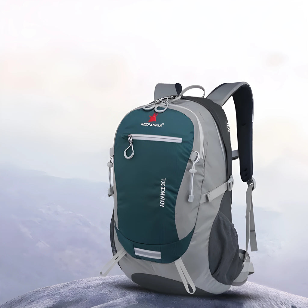 Nylon 30 litre outdoor backpack in dark green with airpillow straps, suitable for hiking and travel.