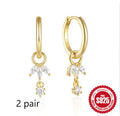 Sterling silver sunflower earrings with geometric design and inlaid zircon stones in golden three diamonds colour