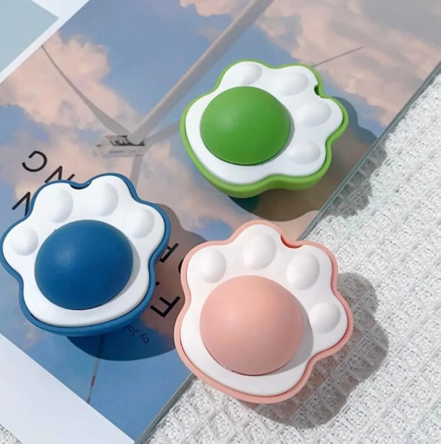 Blue catnip ball with edible vine components for kitten teeth cleaning and interactive play