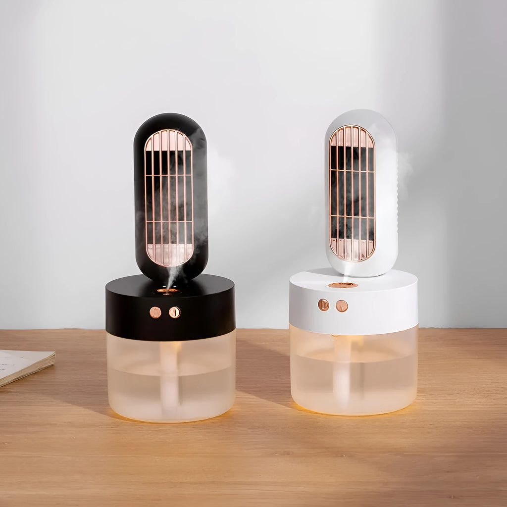 Small black and white portable humidifier fan with oscillating head on desk
