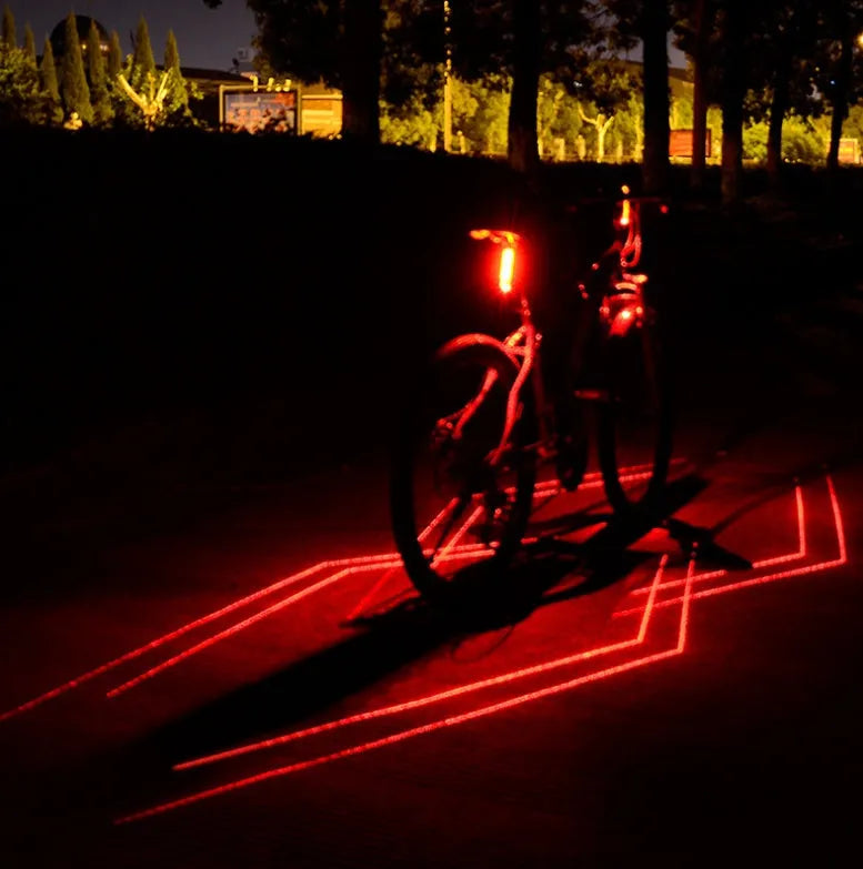Cycling tail light with laser projection, 150LUX, USB rechargeable, IPX5 waterproof, red colour, silicone mount