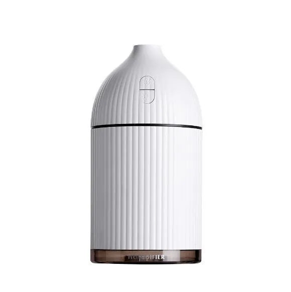 White ultrasonic aromatherapy diffuser with LED light, 300ml water tank, and USB cable.