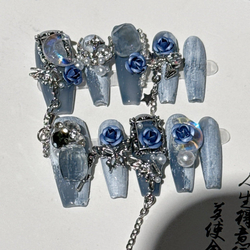 Heavy industry night blue false nails with rose and floral patterns in plastic armour suit