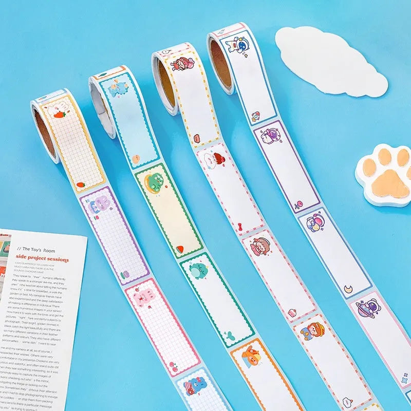 Roll of colourful cartoon name tape stickers showing dinosaur, astronaut, rabbit and girl designs