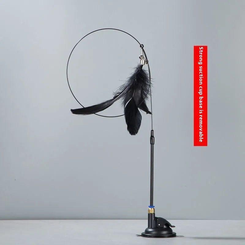 Cat teaser toy with suction cup mount, bell, and feather attachments in multiple colour variations