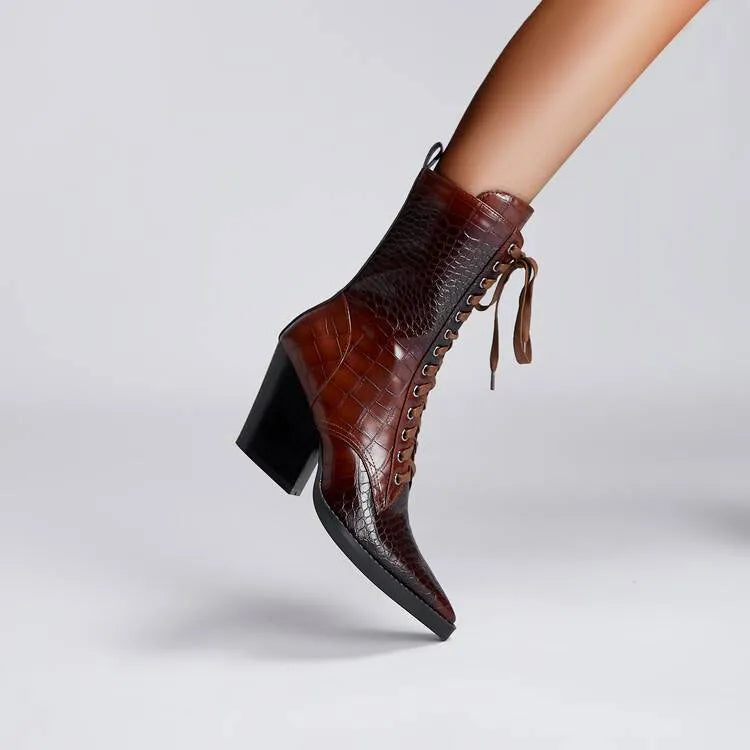 Women's dark brown pointed toe boots with a chunky heel, retro stone pattern, and side zipper.