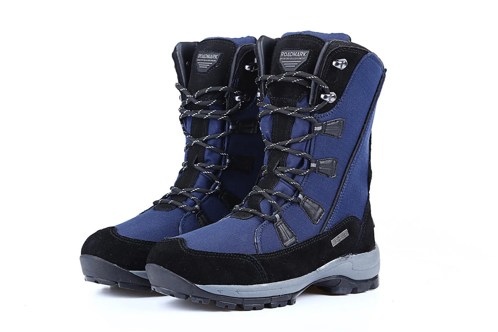 Women's white genuine leather mid-calf snow boots with a round toe and rubber sole on a plain background.