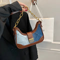 Brown denim women's bucket shoulder bag with diamond mesh, chain detail, and double straps.