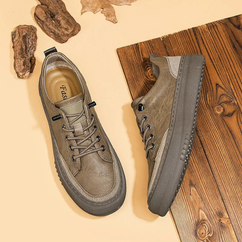 Men's black round toe leather casual shoes with lace-up front on a white background