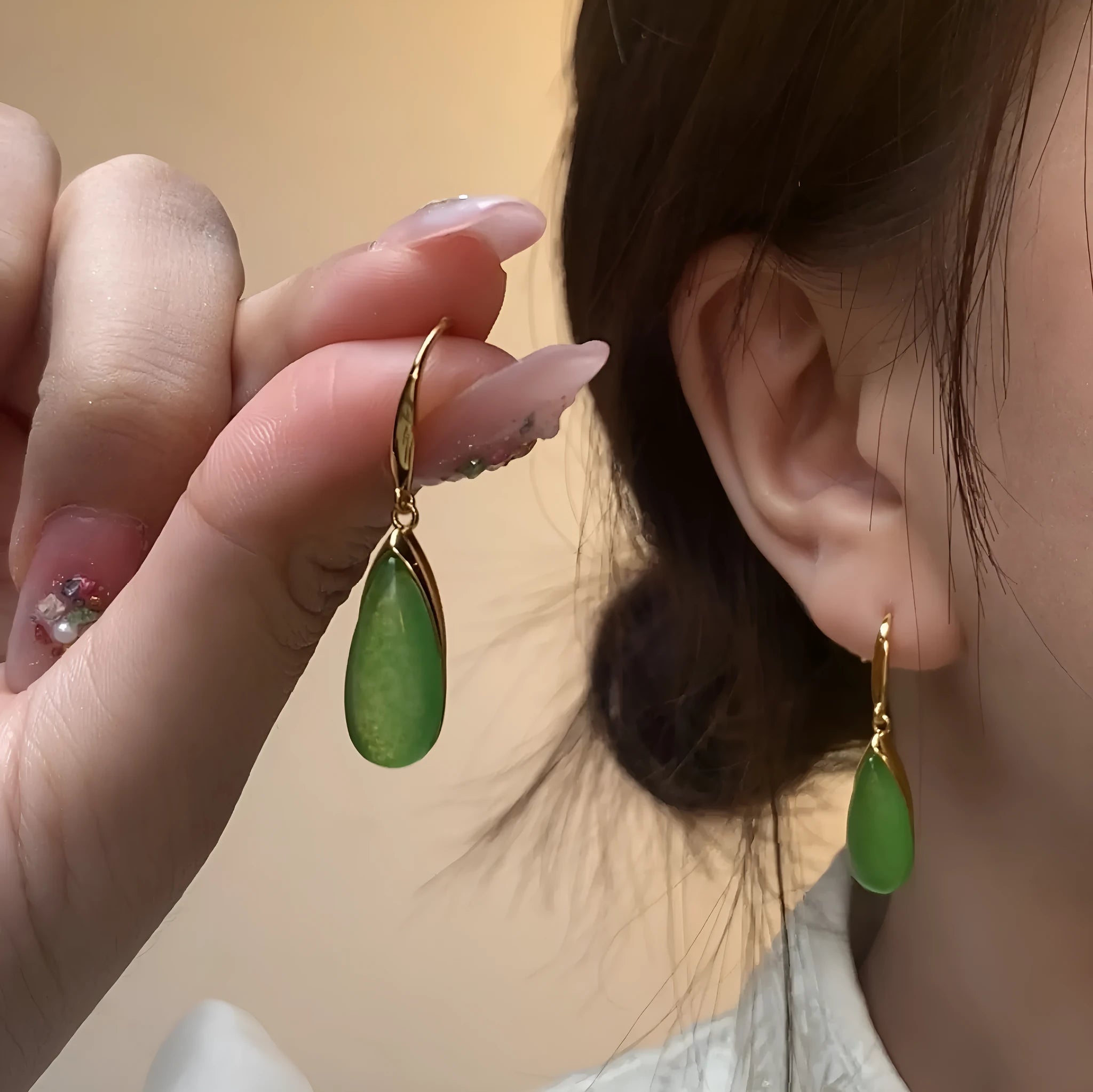 Chinese style geometric earrings in jade colour with water droplet design on copper base with electroplated finish
