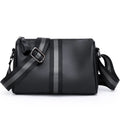 Black genuine leather crossbody shoulder bag showing front view and dimensions
