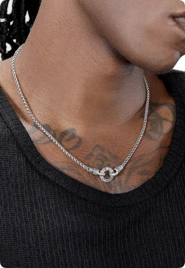 S925 sterling silver clavicle necklace with delicate chain and pendant, shown on a model.