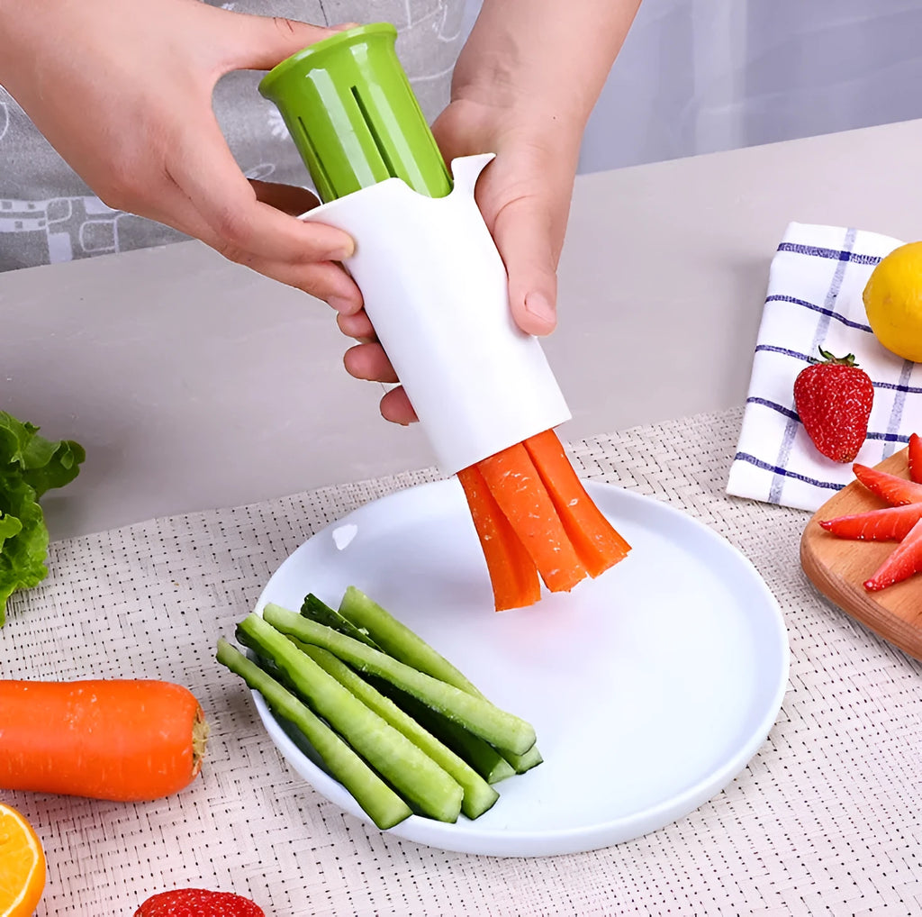White kitchen vegetable fruit slicer with six stainless steel blades for cutting cucumbers carrots strawberries.