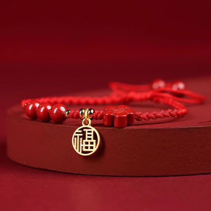 Cinnabar ethnic bracelet with braided rope strap and blessing charm for exam luck symbolism