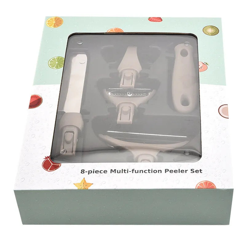 Green three-piece stainless steel kitchen cutter set with wheat straw board, fruit knife and peeler combination