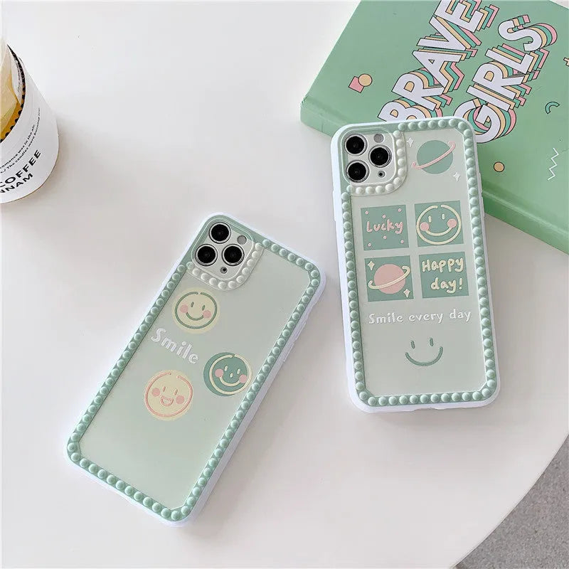 Green iPhone case with smiley face and polka dot geometric design on a soft rubber TPU back cover.