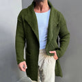 Long sleeve slim-fit mid-length knitted cardigan in army green with button front, on a model, front view