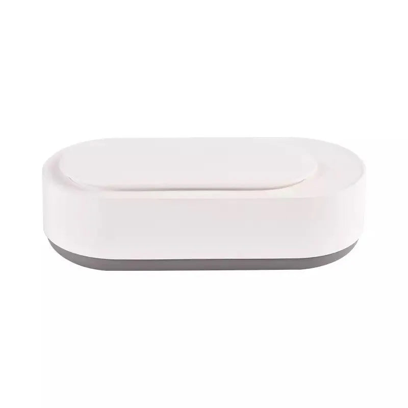 White portable ultrasonic cleaner with stainless steel tank and touch button.