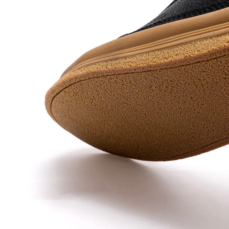 Men's black leather casual shoes with round toe, lace-up closure, and rubber soles