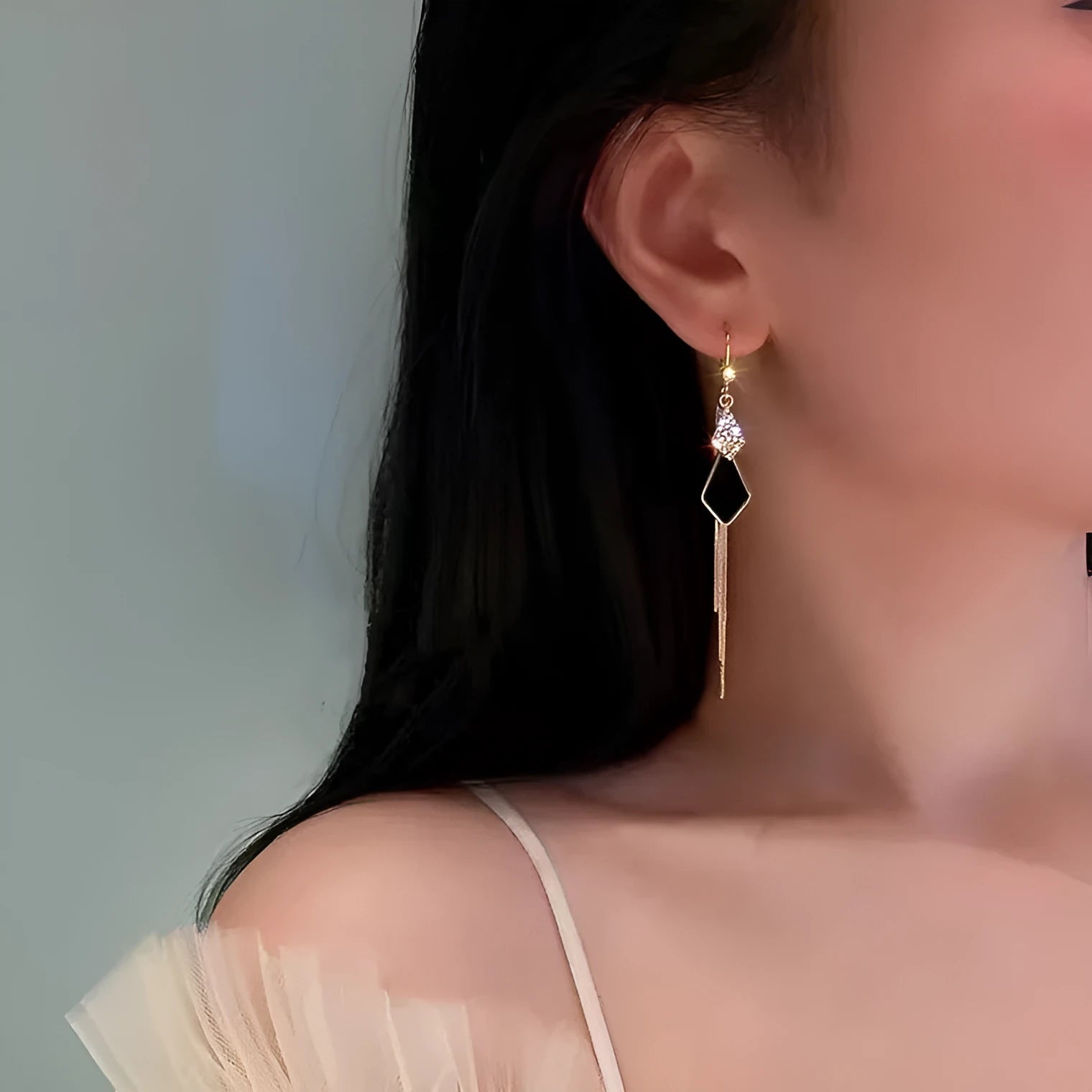 Alloy tassel strip earrings with electroplated finish in white showing Gang Diamond Ice Flower design
