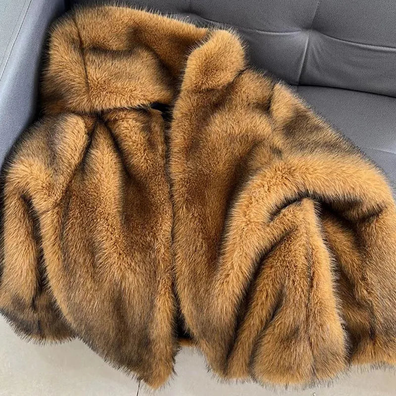 Women's silver grey artificial fur mid-length coat with regular sleeves on a hanger