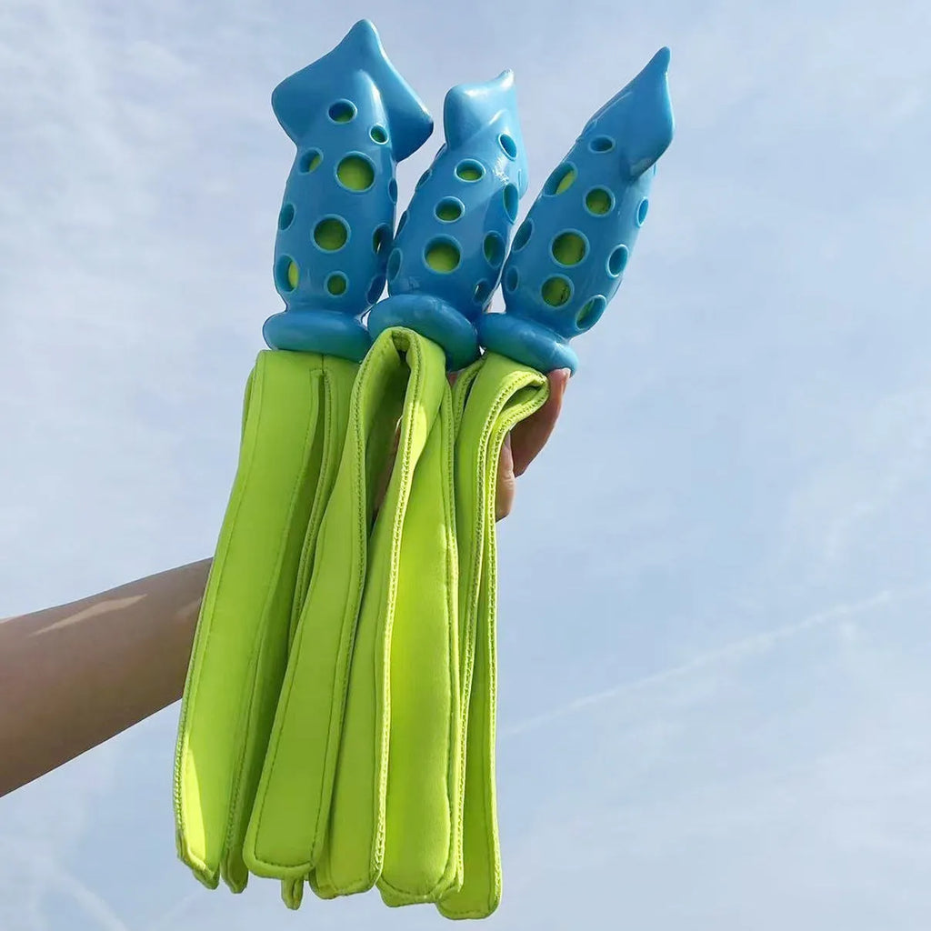 Blue cuttlefish-shaped squeaky dog chew toy, approximately 39cm long, made from rubber and cloth.