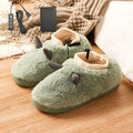 USB-powered electric heating slippers in velvet with plastic sole, showing USB cable connection.