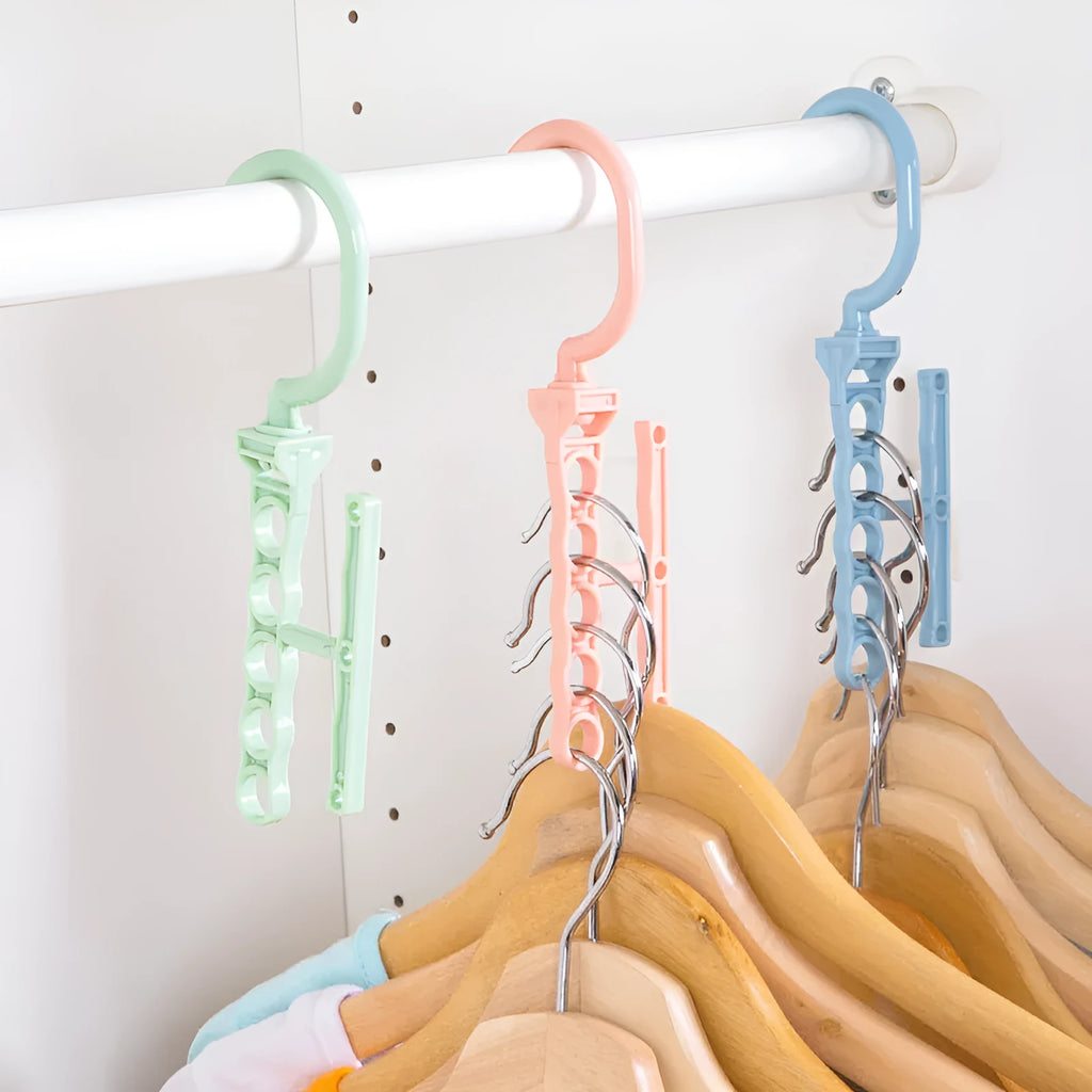 Blue revolving wardrobe hanger with five rotating branches and a central carry handle.