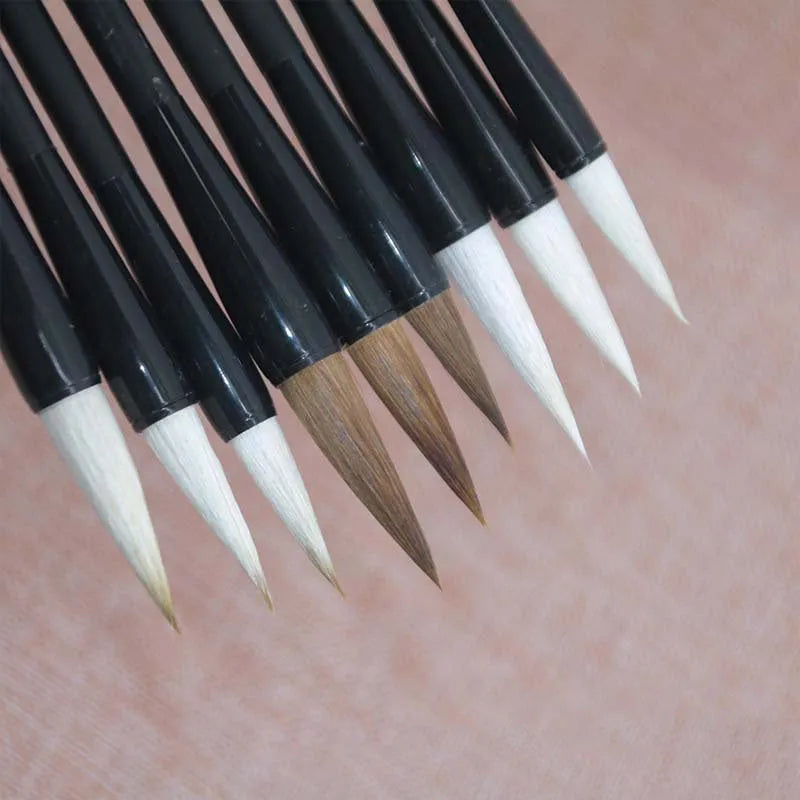 Student calligraphy brush with steel handle, showing kanhao nib and natural hair bristle options.