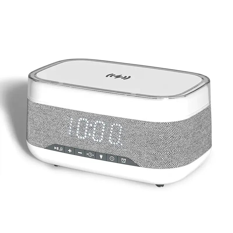 White multifunctional alarm clock with Bluetooth speaker and wireless charging pad