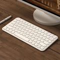 Mute ultra-thin wireless keyboard and optical mouse set in white, black, or pink colour options.