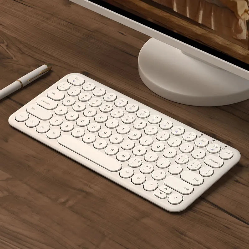 Mute ultra-thin wireless keyboard and optical mouse set in white, black, or pink colour options.