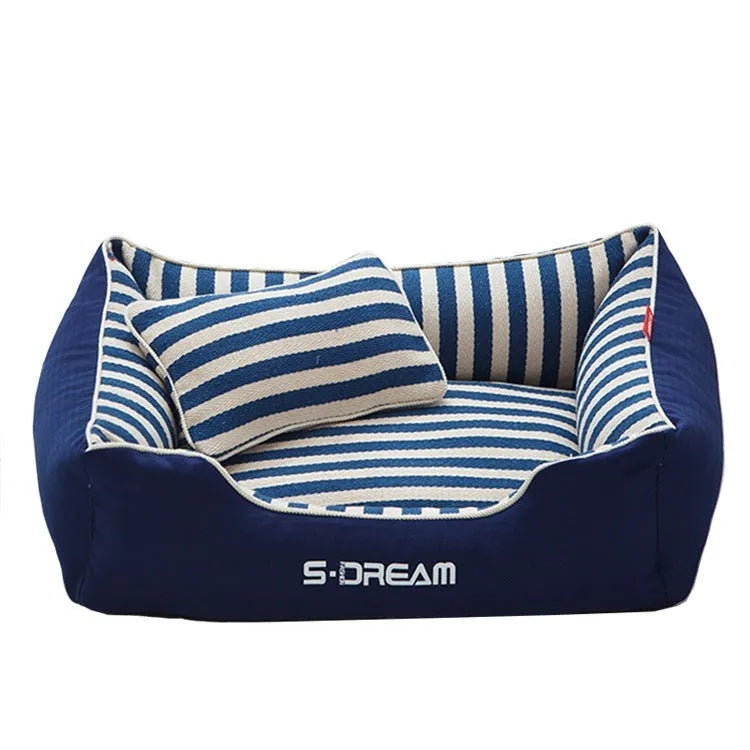 Navy stripes dog crate mat and matching fabric pillow set on a white background.