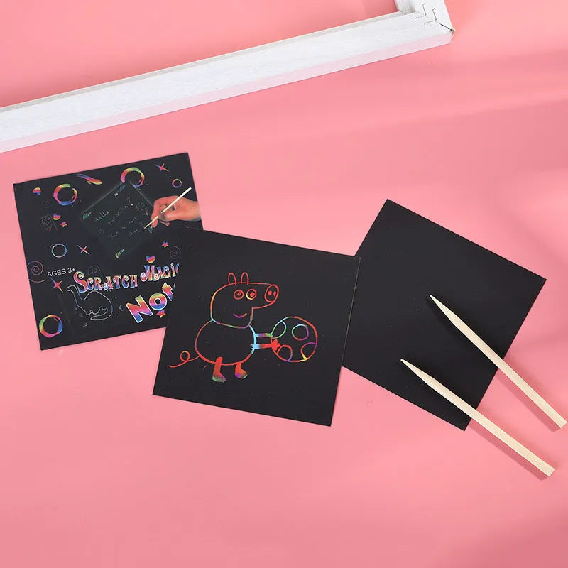 Colour box containing 100 black scratch art cards and a wooden stylus for kids' creative painting.